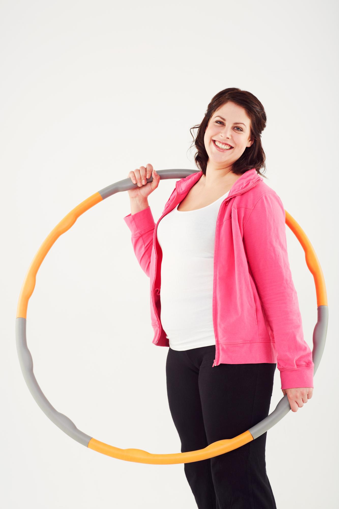 Instructor smiling with embroidery hoop