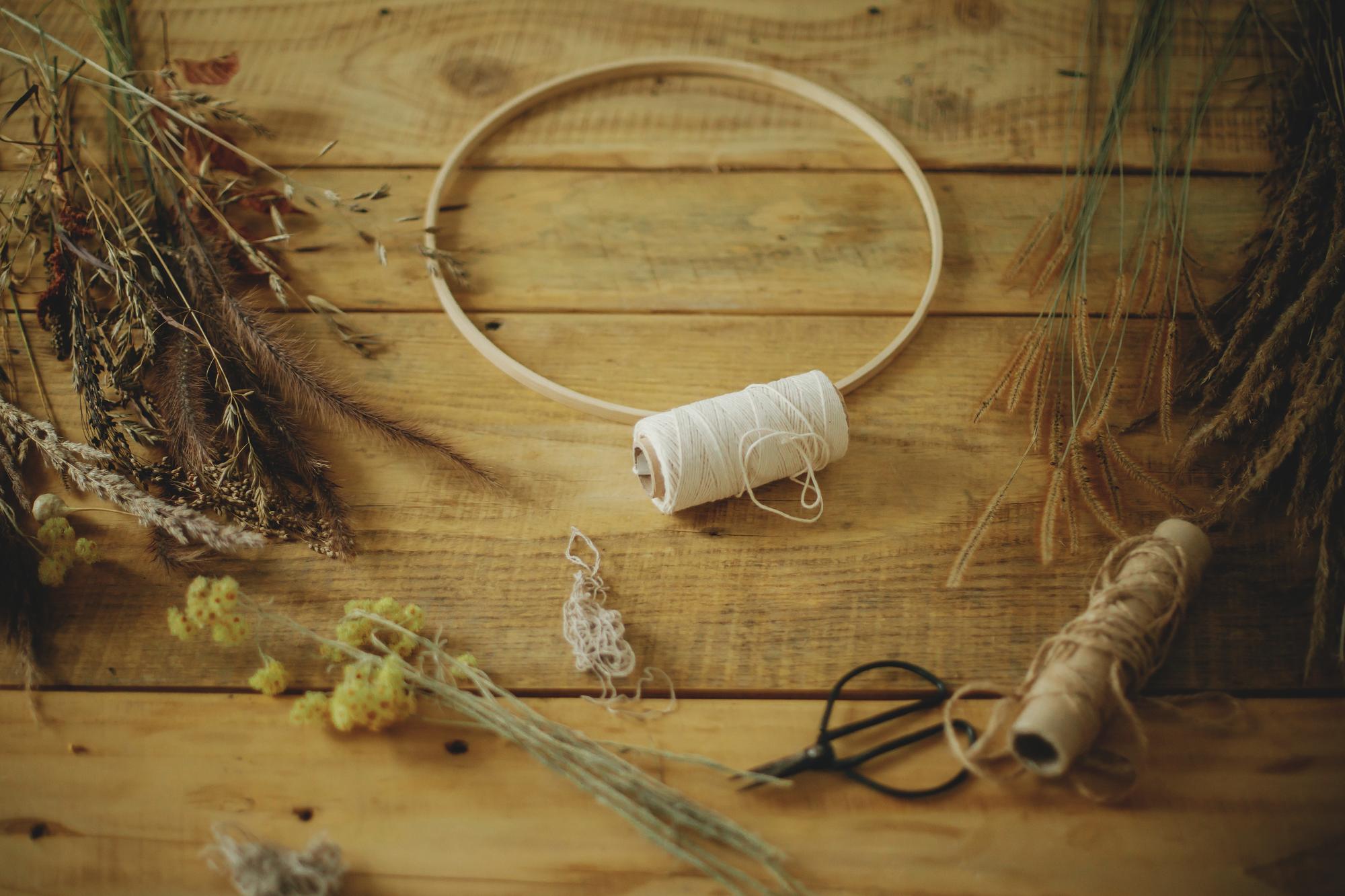 Close-up of hand embroidery hoop on linen